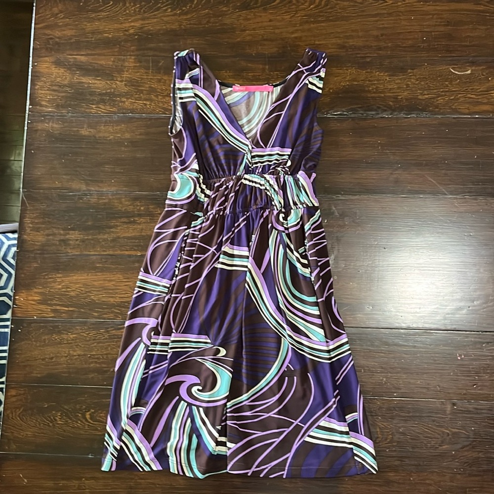 Curtsey dress with pockets and very cool print size small